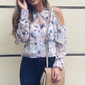 Floral cutout detail blouse.